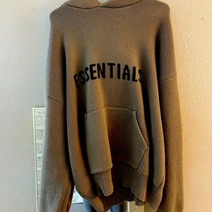 Taupe knit essential sweater.